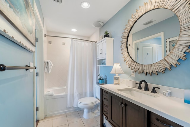 full bathroom with shower / tub combo, vanity, toilet, and tile patterned floors