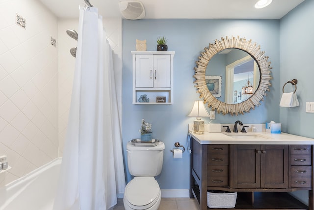 full bathroom featuring shower / bath combo with shower curtain, tile patterned flooring, vanity, and toilet