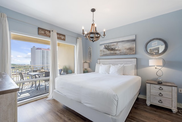 bedroom featuring access to outside, an inviting chandelier, and dark hardwood / wood-style flooring