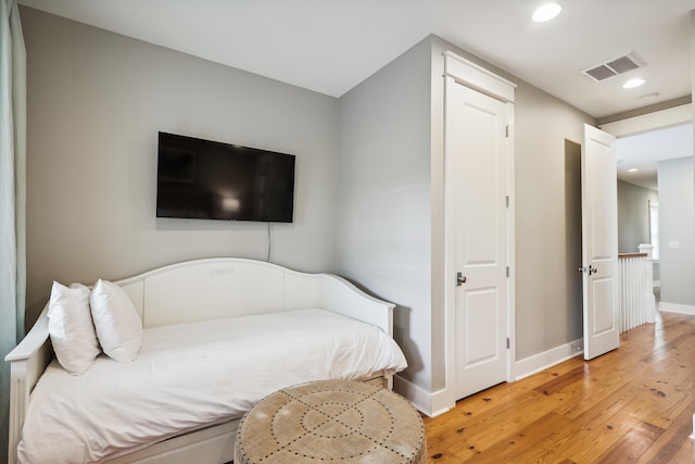 bedroom featuring hardwood / wood-style floors