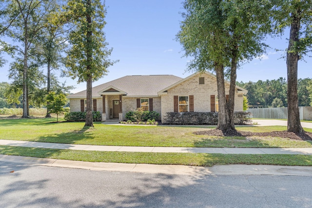 view of front of house with a front lawn