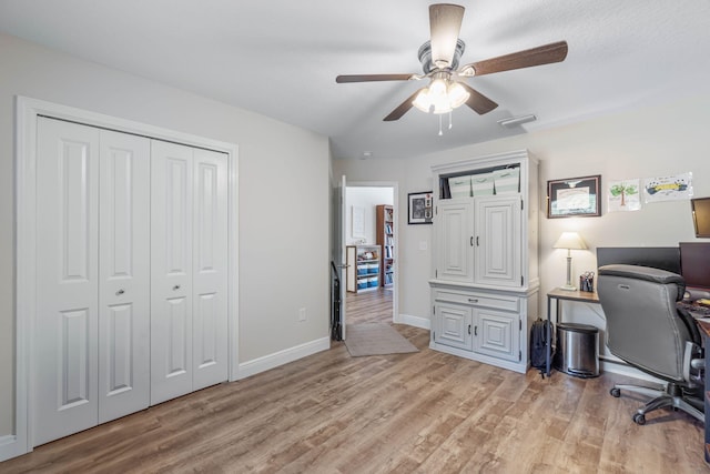 office area featuring ceiling fan and light hardwood / wood-style floors