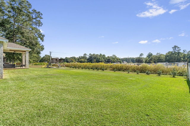 view of yard featuring a playground