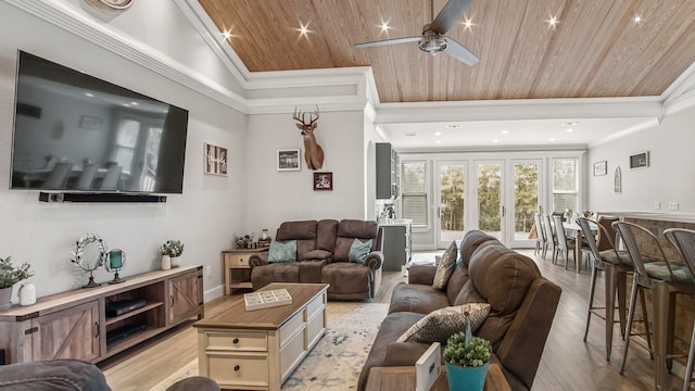 living room with ceiling fan, lofted ceiling, wooden ceiling, crown molding, and light hardwood / wood-style floors