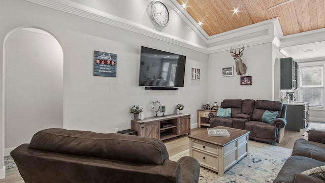 living room featuring wooden ceiling, light hardwood / wood-style floors, ornamental molding, and high vaulted ceiling