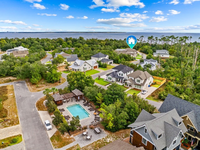 bird's eye view with a water view