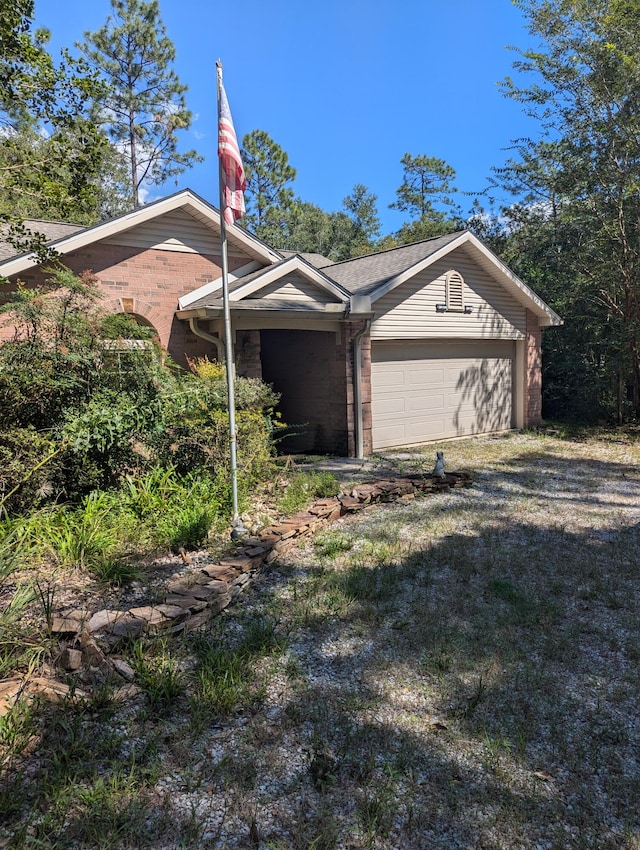 view of property exterior featuring a garage