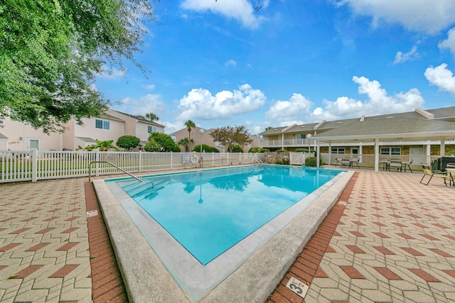 view of pool with a patio area