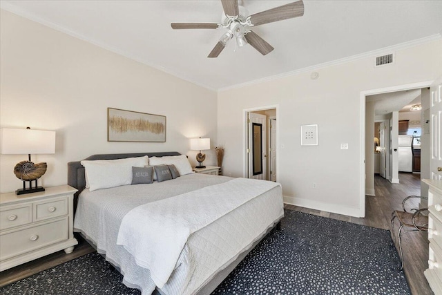 bedroom with ceiling fan, dark hardwood / wood-style flooring, and ornamental molding