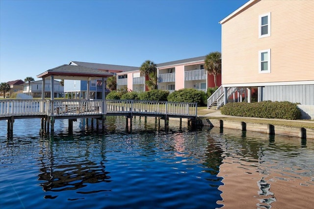 exterior space with a water view