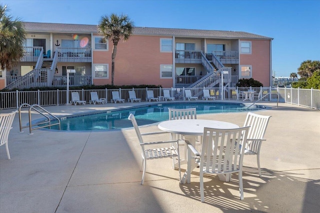 view of pool with a patio area