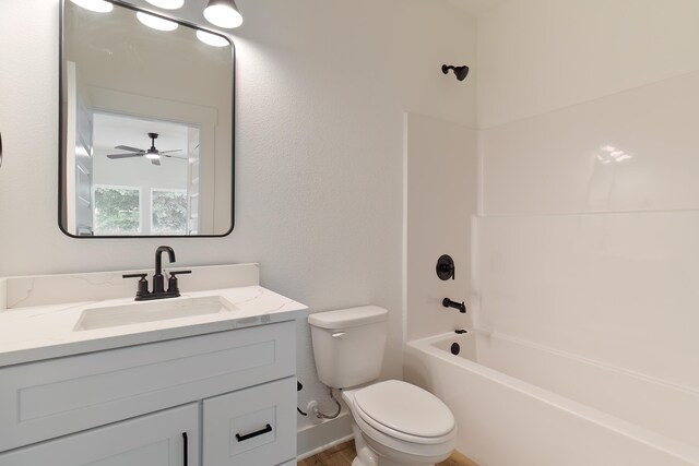 full bathroom with vanity, shower / tub combination, and toilet