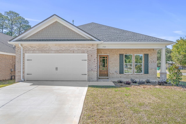 view of front of property with an attached garage, driveway, a shingled roof, and brick siding