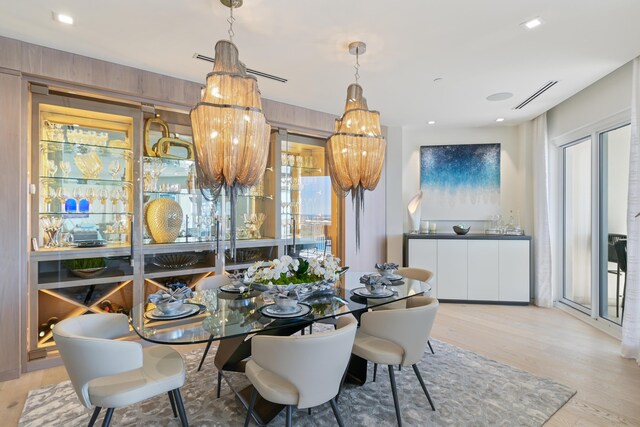 dining area with light hardwood / wood-style flooring