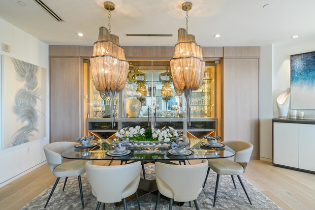 dining room with light hardwood / wood-style flooring