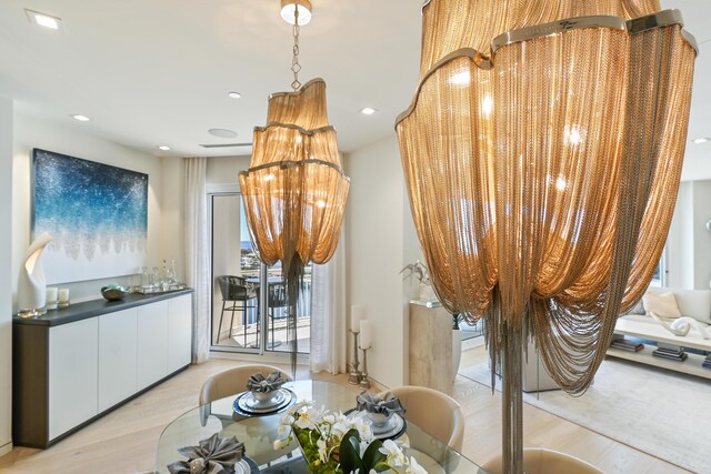 dining area with light hardwood / wood-style flooring