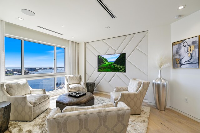 living room with light hardwood / wood-style floors