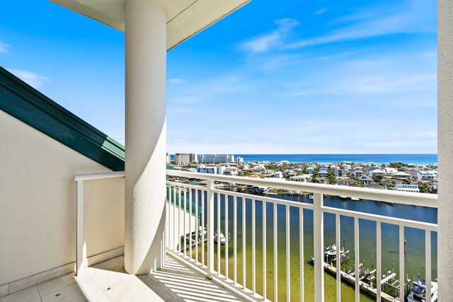 balcony featuring a water view