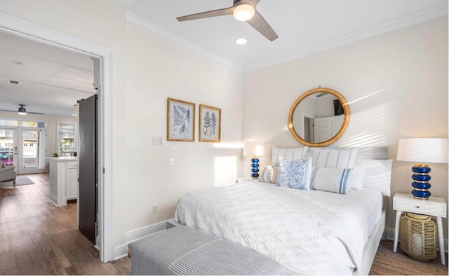 bedroom with ceiling fan, dark hardwood / wood-style floors, and ornamental molding