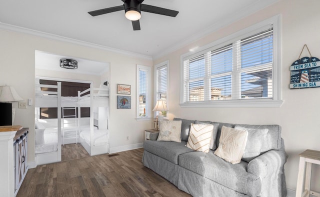 living room with ceiling fan, crown molding, and dark hardwood / wood-style flooring