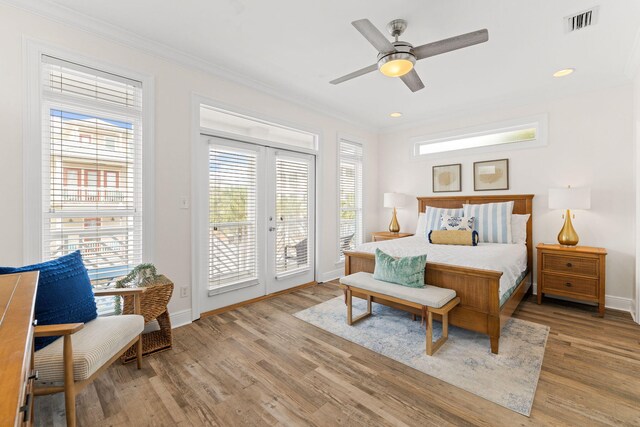 bedroom featuring ornamental molding, hardwood / wood-style floors, ceiling fan, and access to exterior