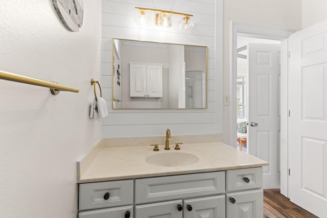 bathroom featuring wood-type flooring and vanity