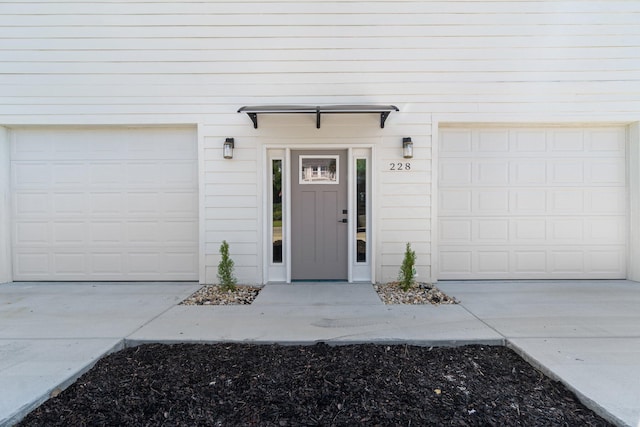 property entrance with a garage