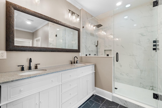 bathroom with ornamental molding, a shower with door, and vanity