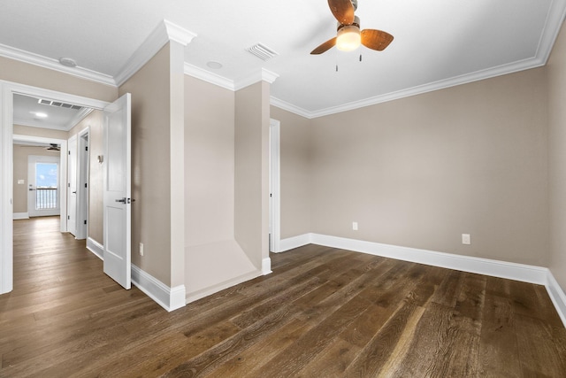 spare room with dark wood-type flooring, ornamental molding, and ceiling fan