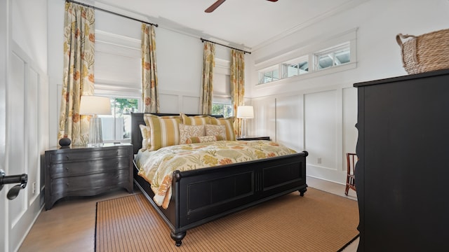 bedroom featuring hardwood / wood-style flooring and ceiling fan