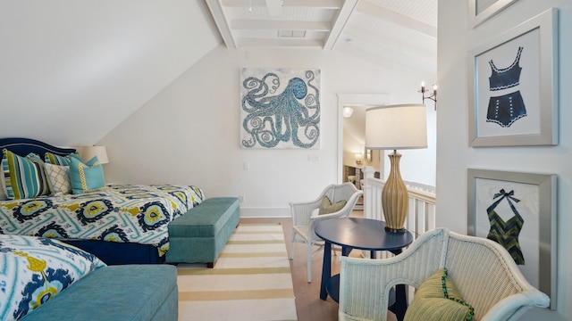 bedroom with lofted ceiling with beams and a chandelier