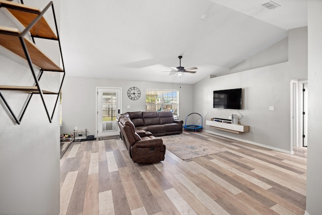 living room featuring light wood-type flooring, ceiling fan, and lofted ceiling