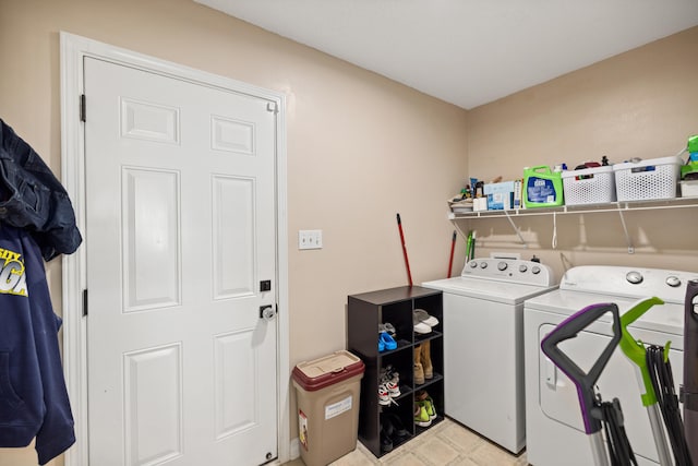 laundry area with washer and clothes dryer