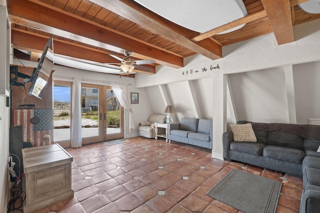 living room featuring beamed ceiling, wooden ceiling, ceiling fan, dark tile patterned floors, and french doors