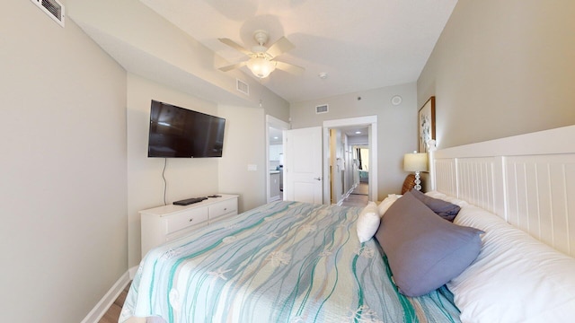 bedroom featuring ceiling fan and hardwood / wood-style floors