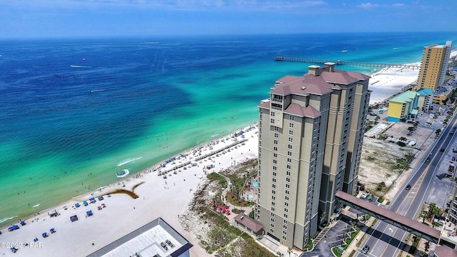 drone / aerial view with a view of the beach and a water view