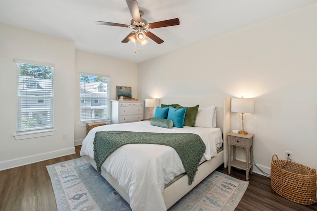 bedroom featuring dark wood-type flooring and ceiling fan