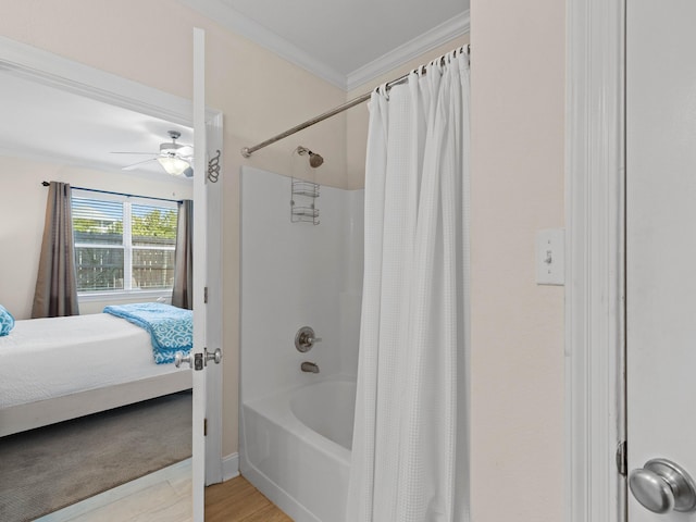 bathroom with shower / bath combo with shower curtain, ceiling fan, hardwood / wood-style floors, and crown molding