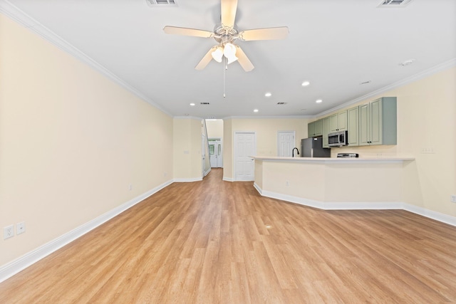 unfurnished living room with ornamental molding, light wood-type flooring, and ceiling fan