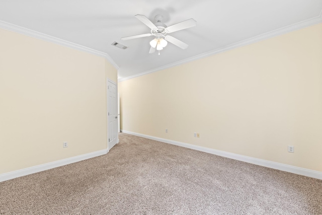 carpeted spare room featuring ornamental molding and ceiling fan