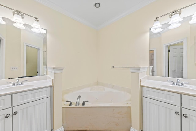 bathroom with ornamental molding, a washtub, and vanity