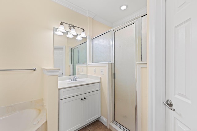 bathroom with independent shower and bath, vanity, ornamental molding, and tile patterned floors