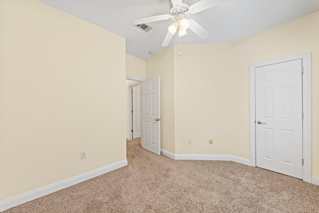 unfurnished bedroom featuring ceiling fan and light colored carpet