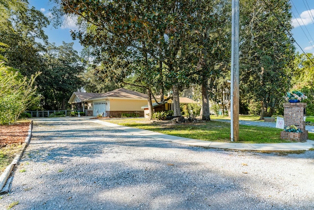 view of front of home featuring a front lawn