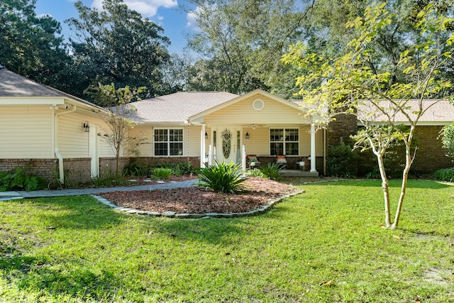 single story home featuring a front lawn and covered porch