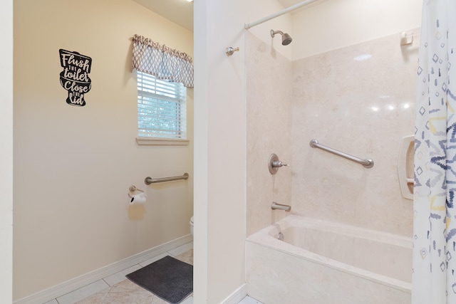 bathroom with toilet, shower / tub combo, and tile patterned flooring