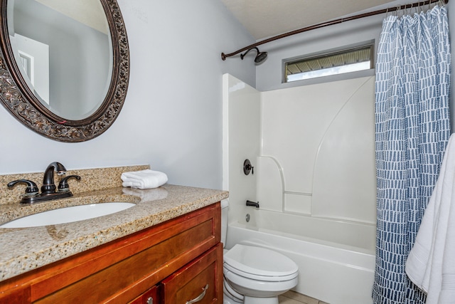 full bathroom with vanity, shower / bath combo, a textured ceiling, and toilet