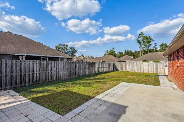 view of yard with a patio area