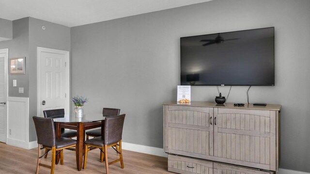 dining space with light hardwood / wood-style floors