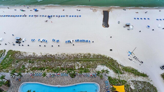 bird's eye view featuring a beach view and a water view